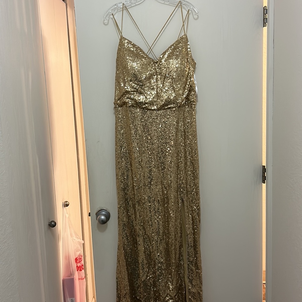 Gold shiny mother of the bride dress very elegant.